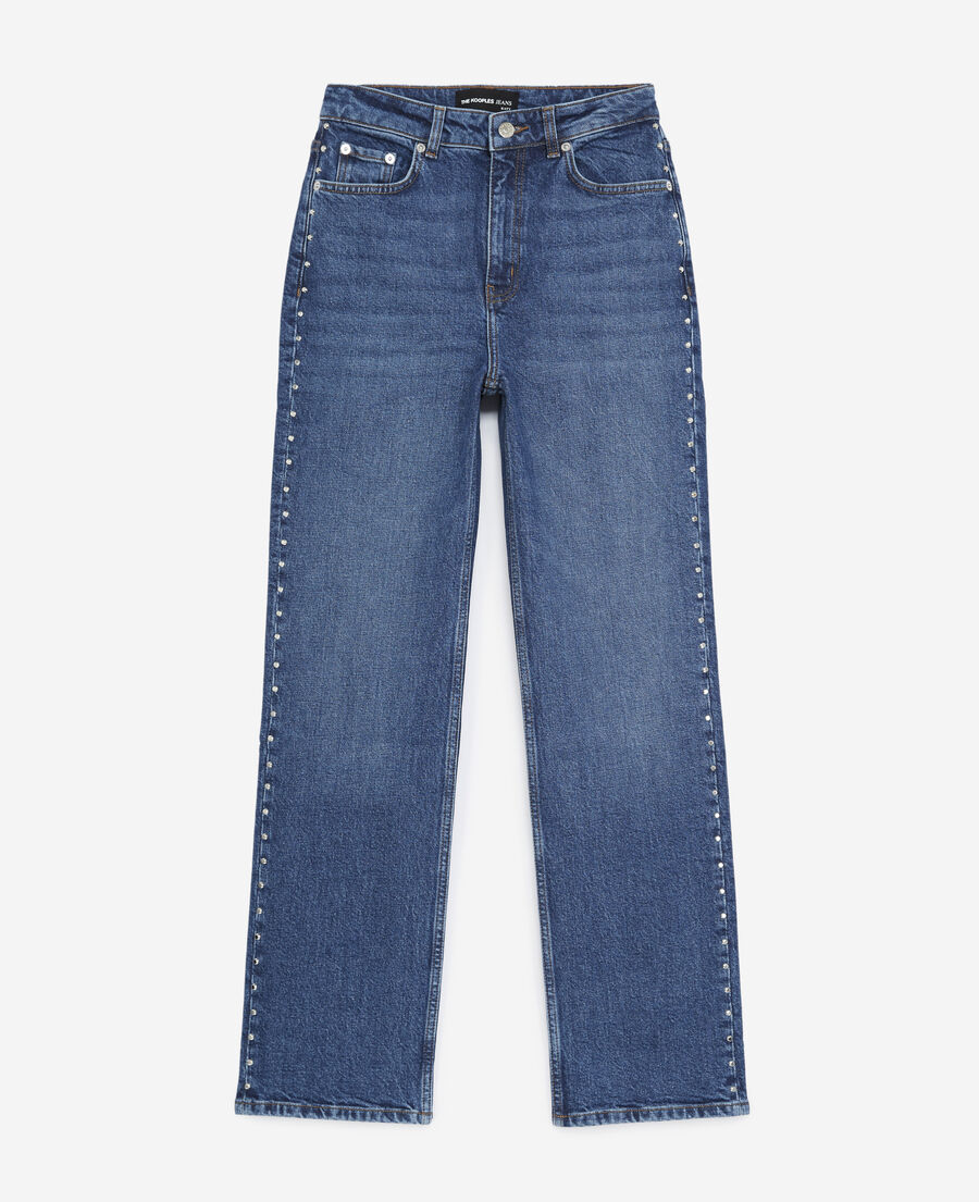 Faded blue jeans with silver studs