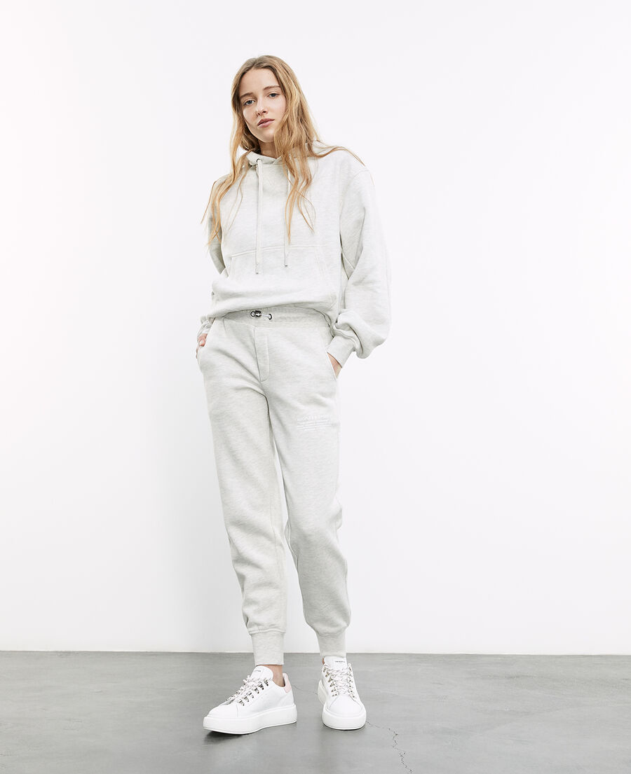 gray joggers with rubber logo