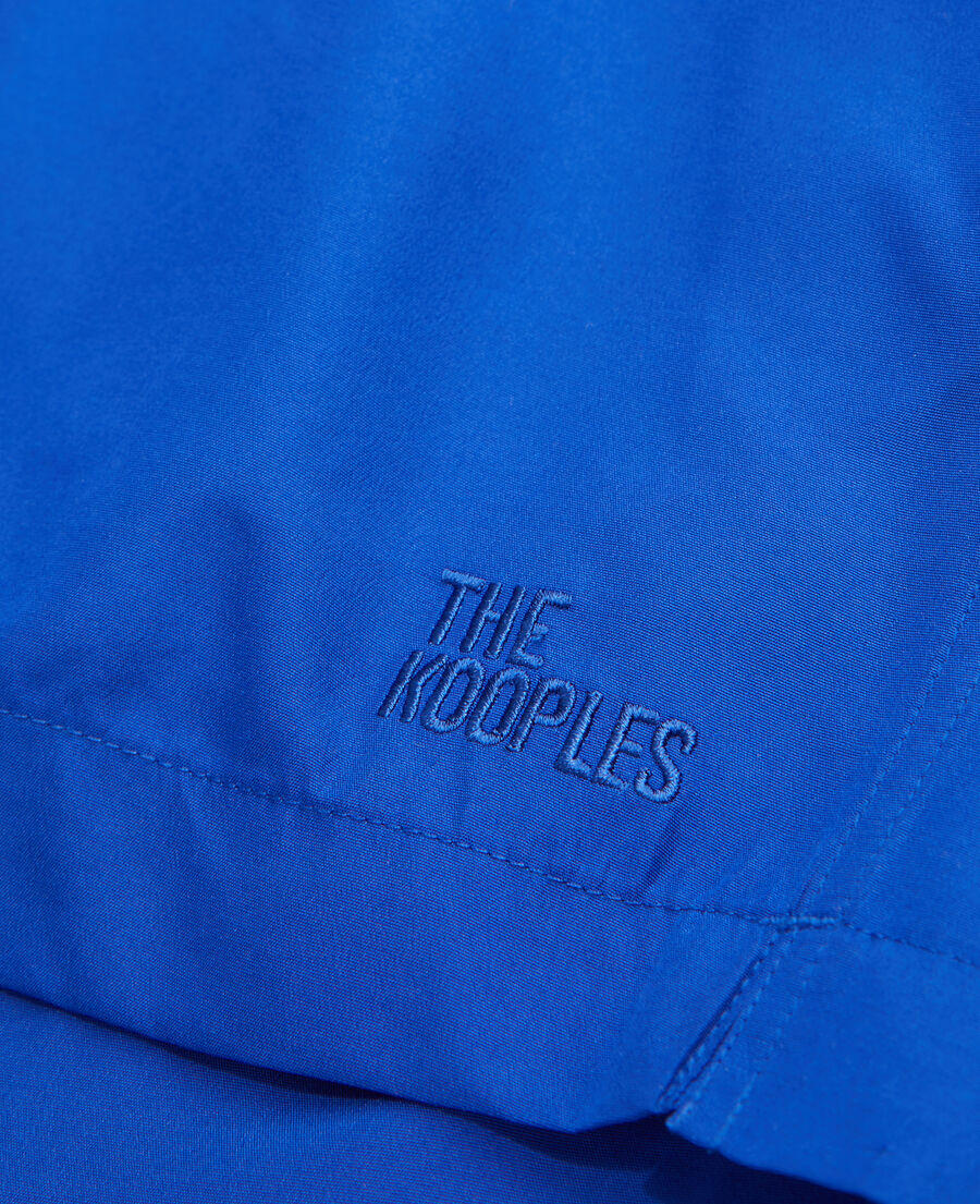 blaue badeshorts mit logo