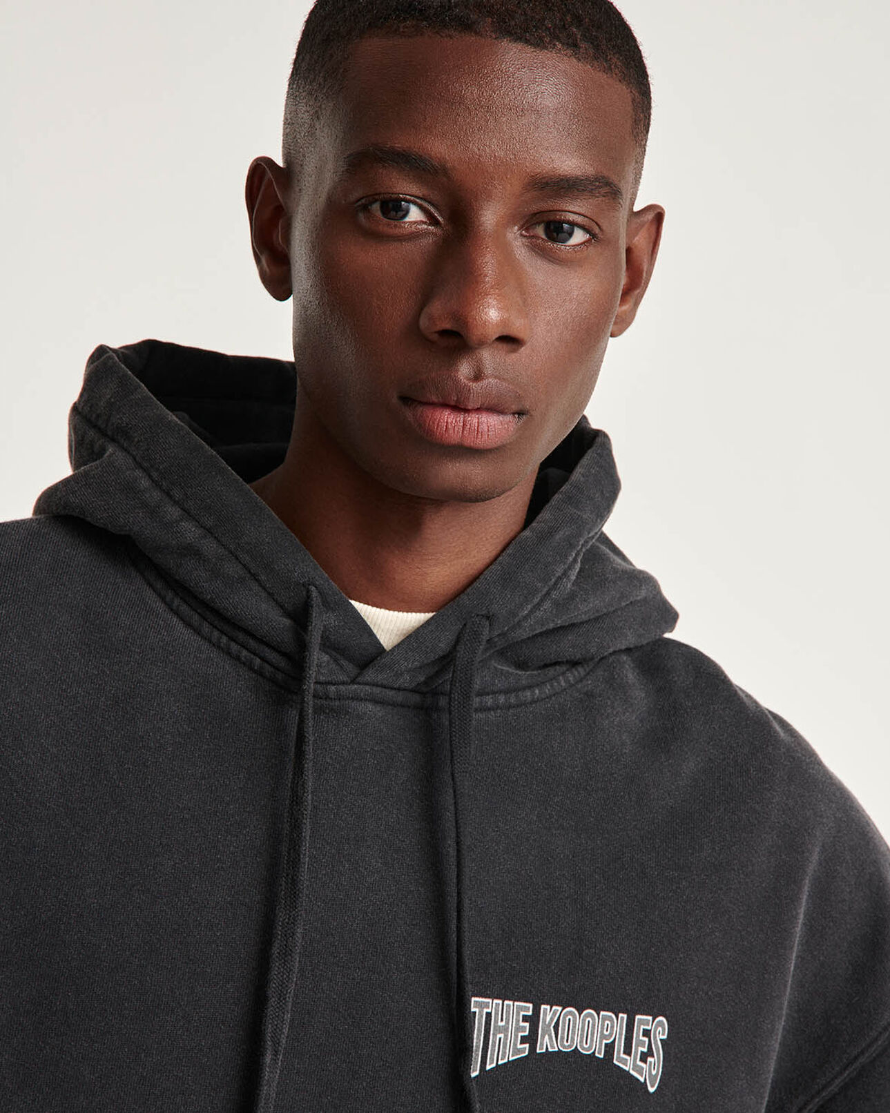 The Kooples MEN BLACK WASHED cotton black hoodie with printed logo
