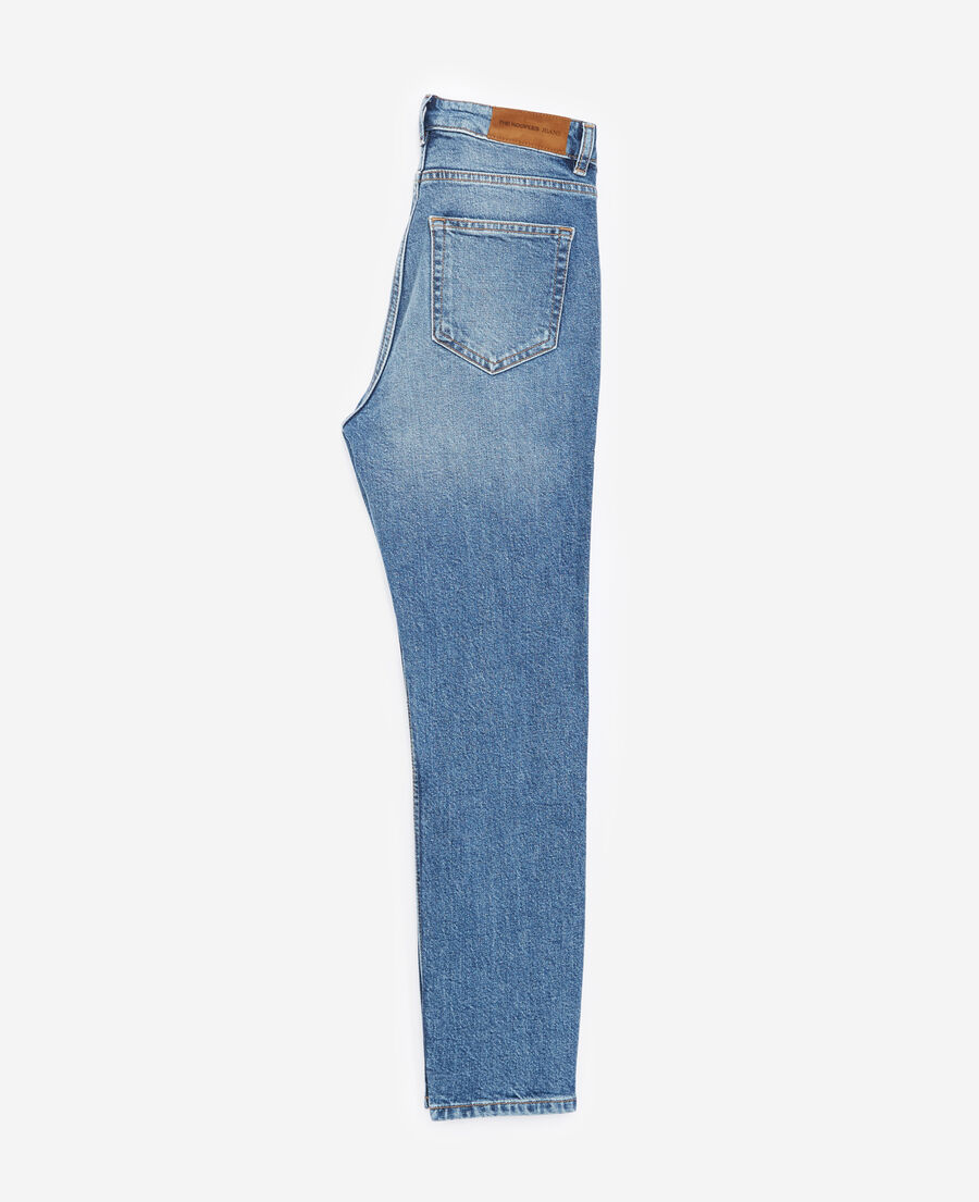 blaue verwaschene jeans mit knöpfen