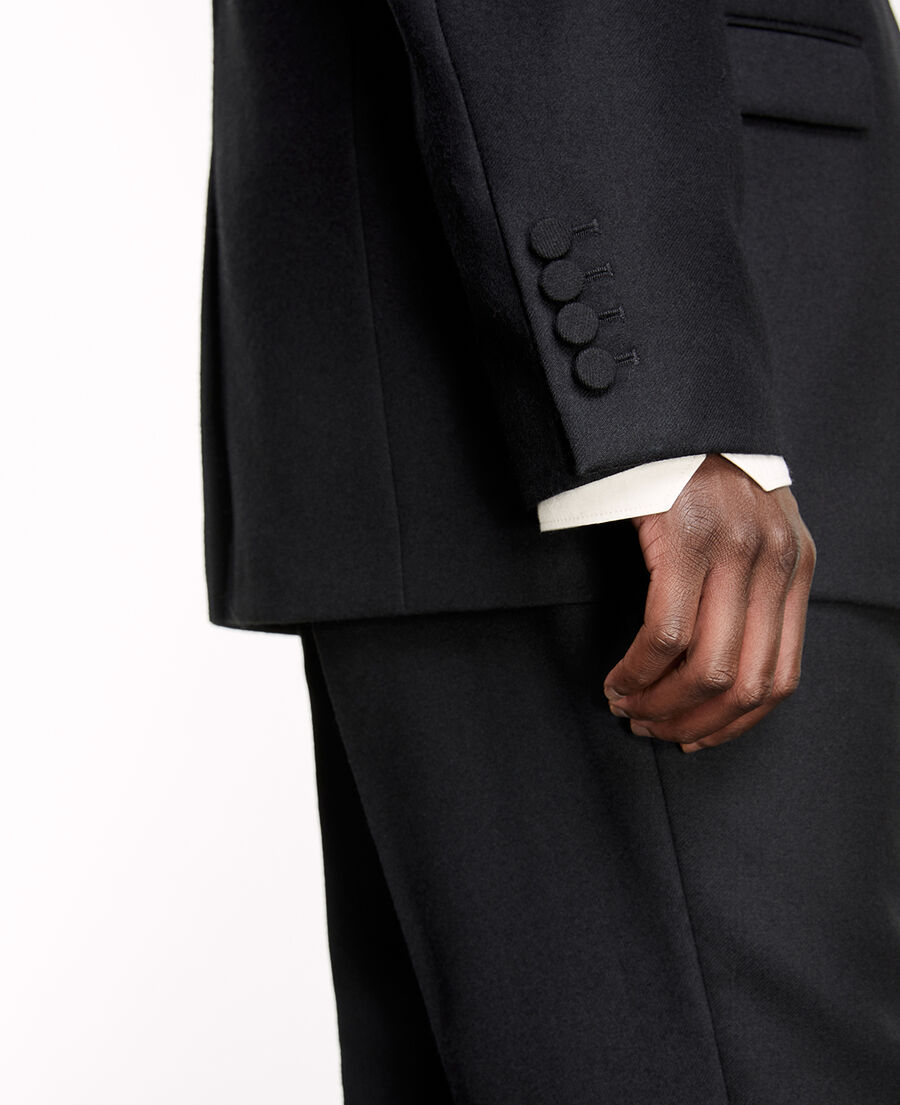 black jacket with covered buttons
