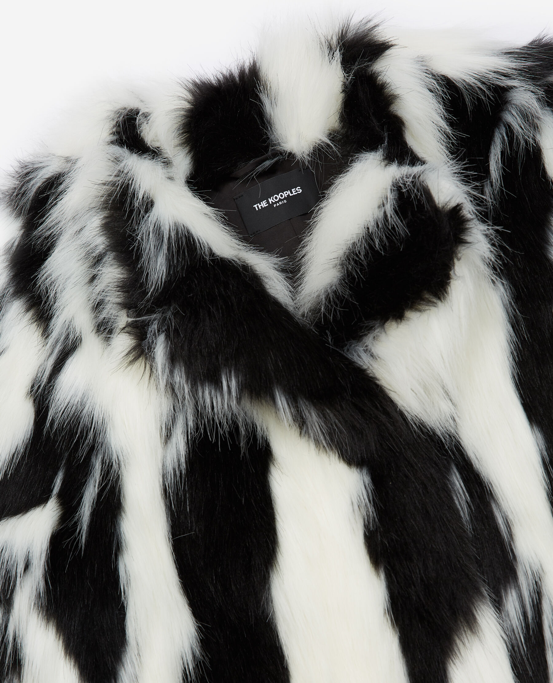 Manteau noir shop fourrure blanche