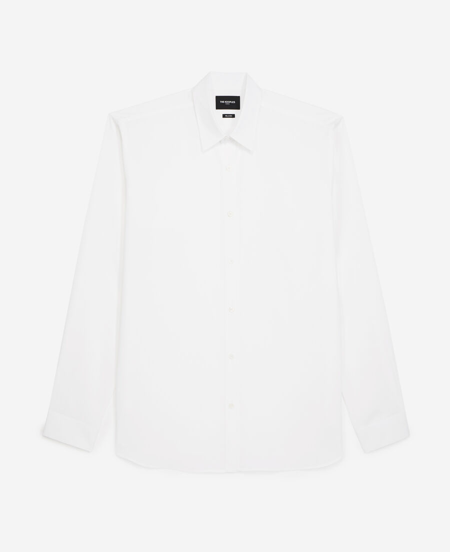 flowing white shirt with long sleeves