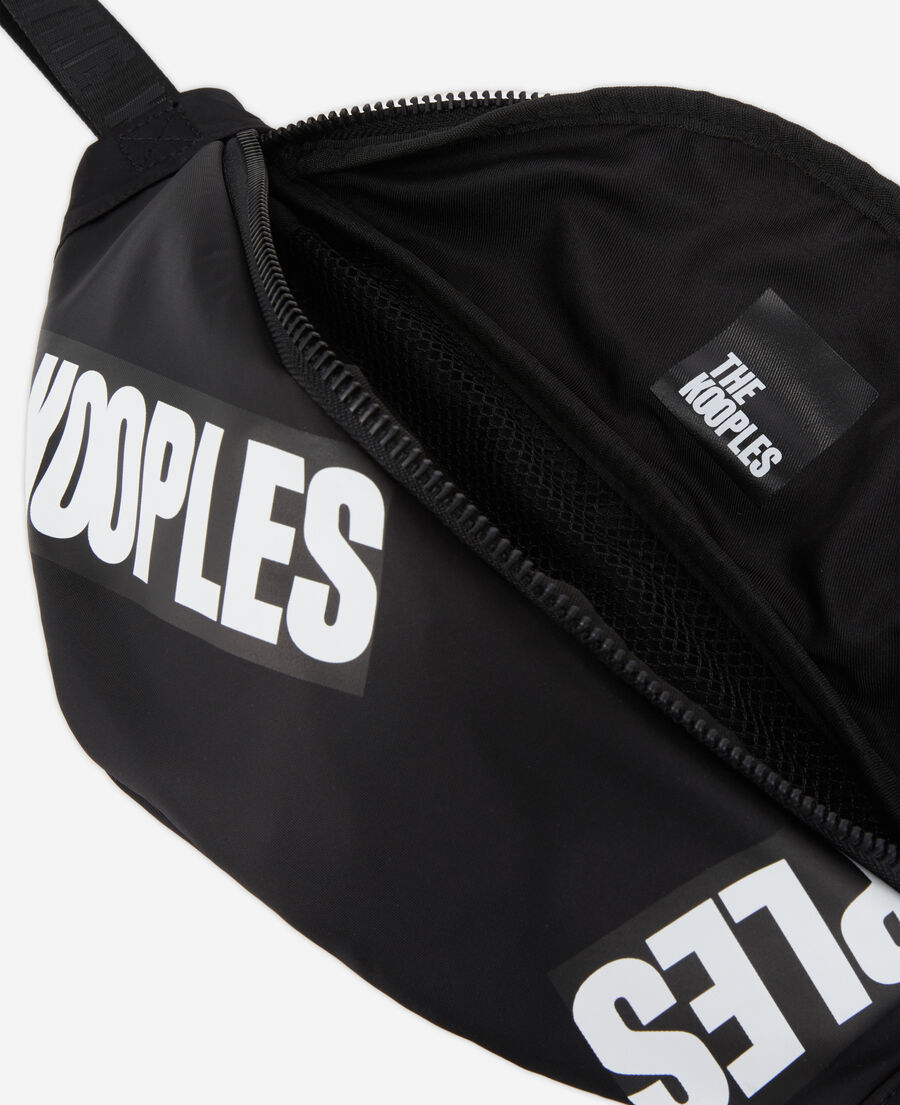 black waist bag with tape logo