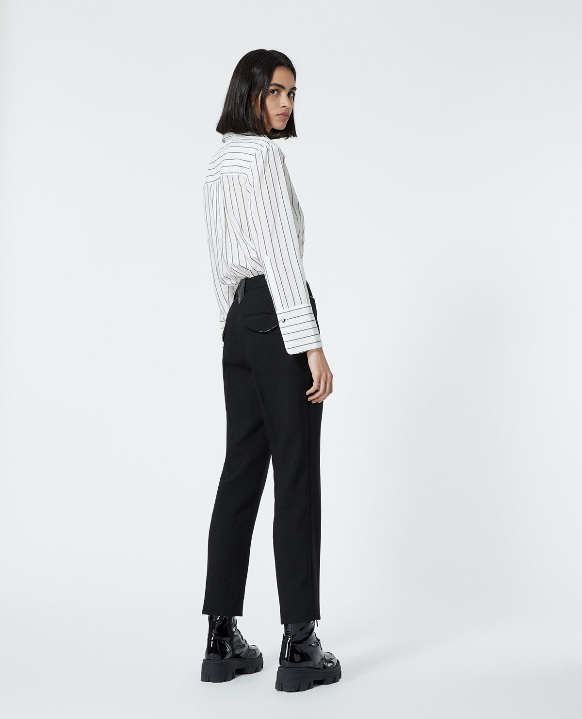 Straight black wool pants w/leather detail | The Kooples