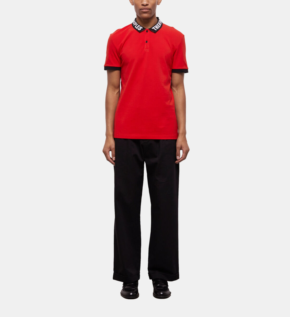 Black polo shirt top with red logo