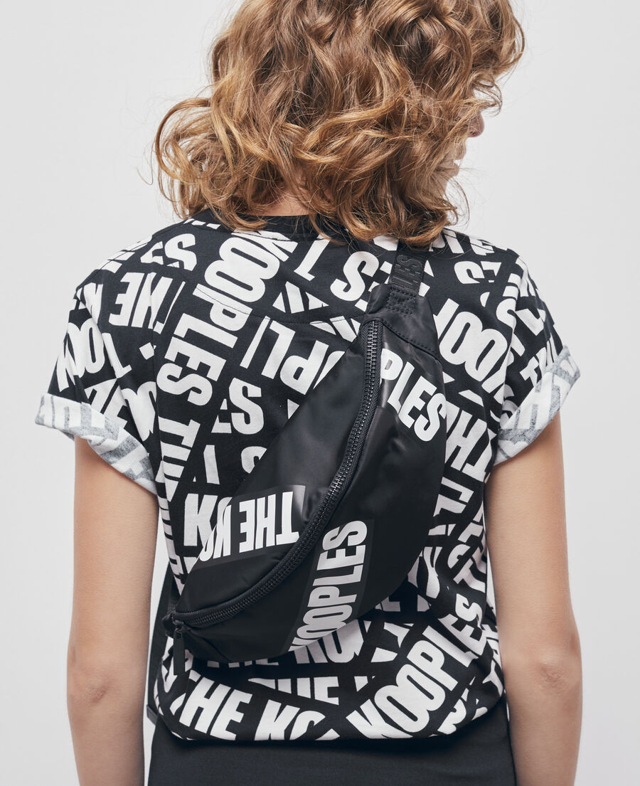 black waist bag with tape logo