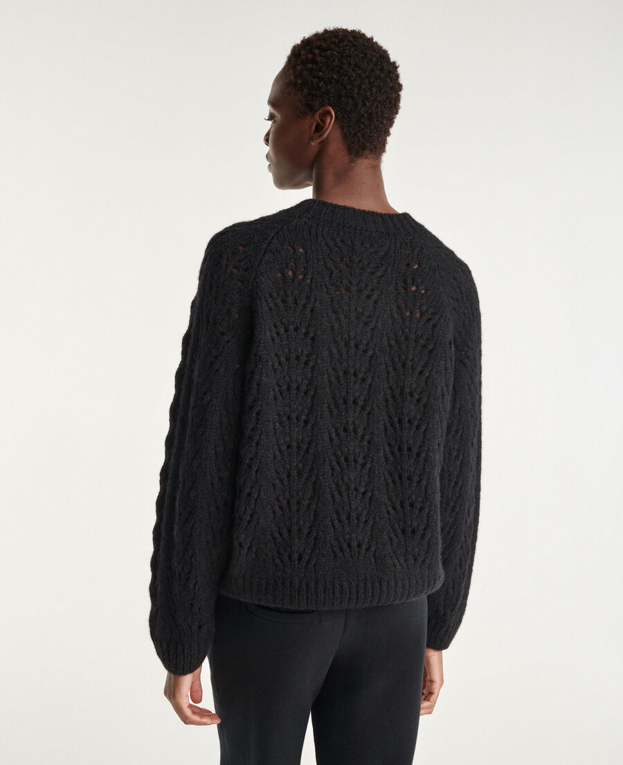 knit black sweater with puffed sleeves