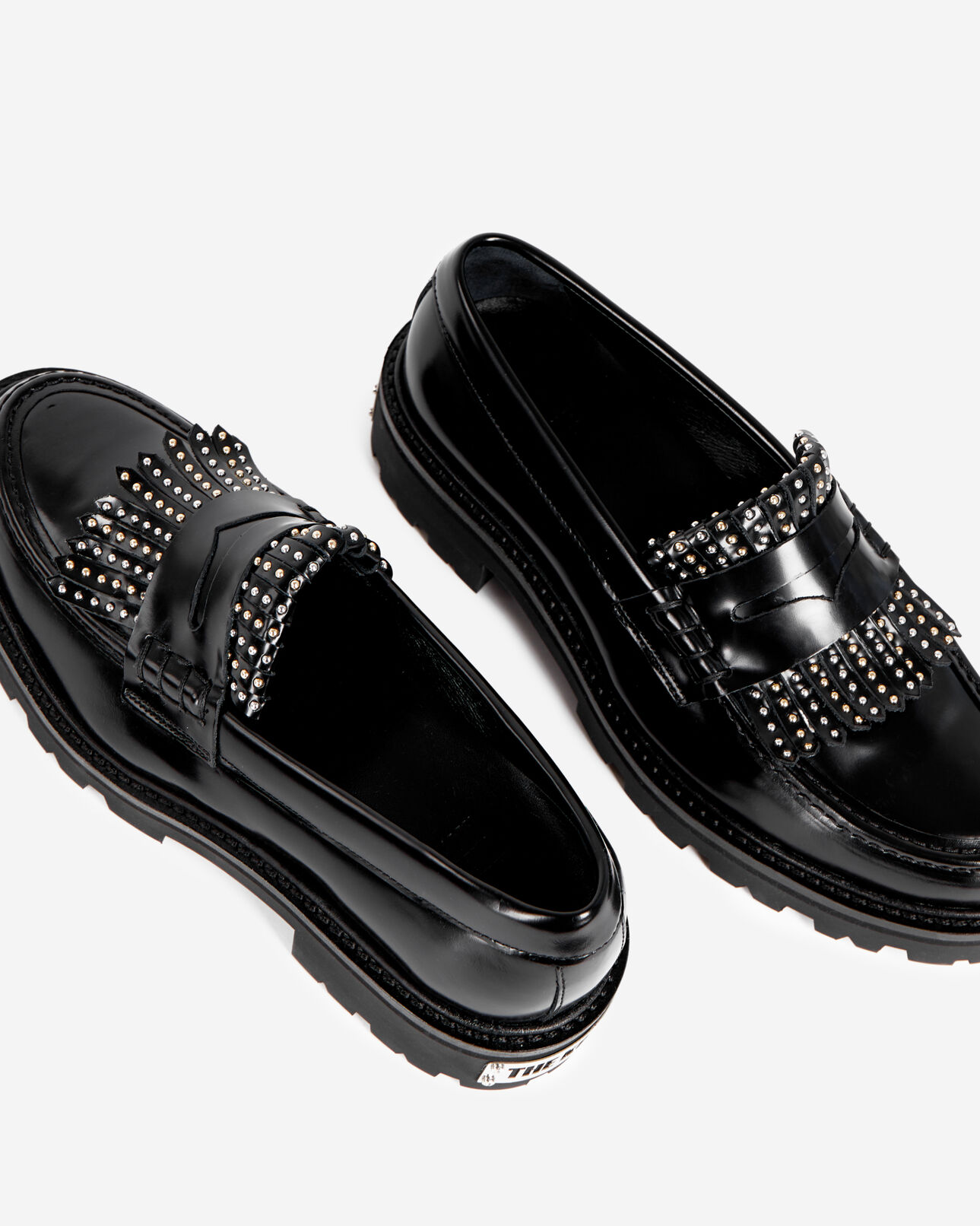 The Kooples FEMME BLACK mocassins penny en cuir noir avec franges et studs