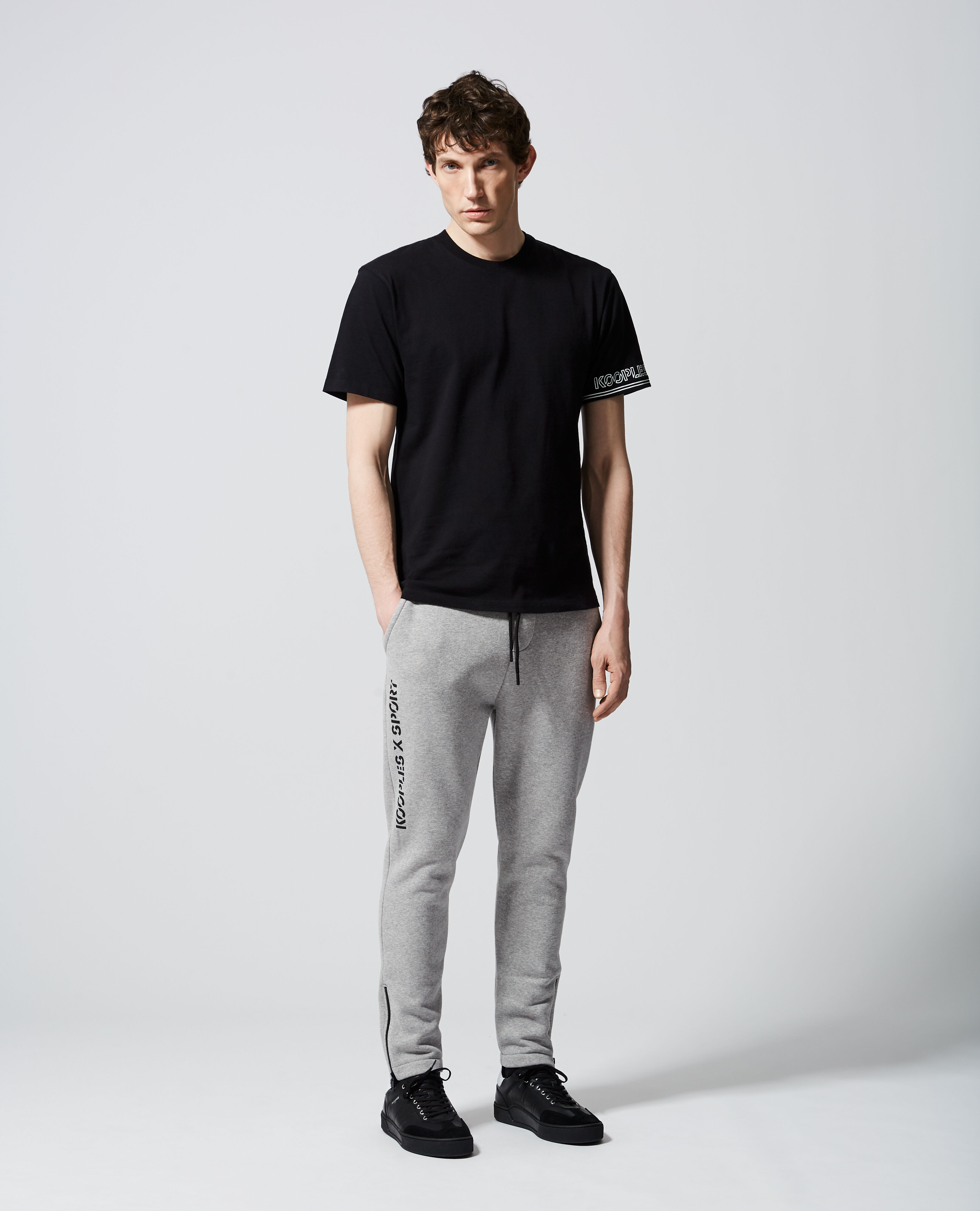 Slim grey fleece joggers with zipped bottoms The Kooples