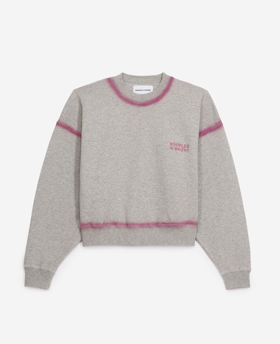 gray sweatshirt with pink details and fading