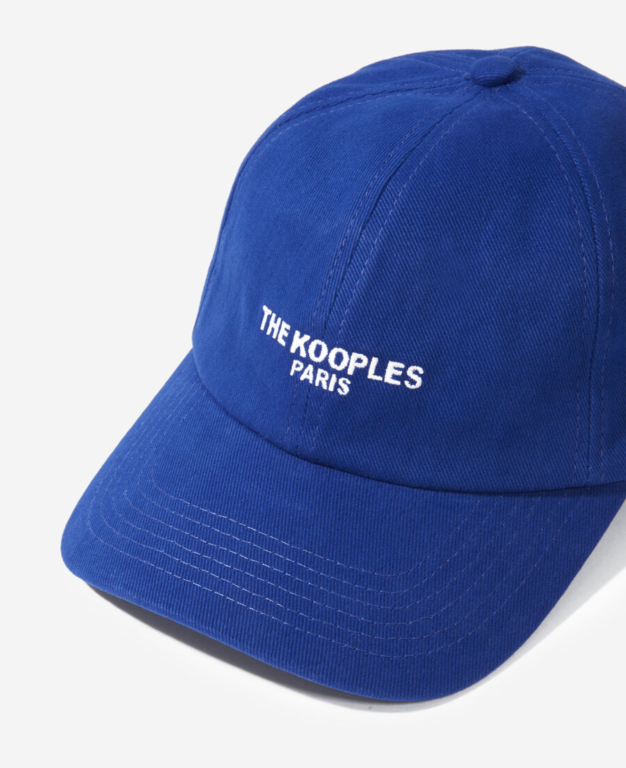 blue cotton cap with white embroidered logo