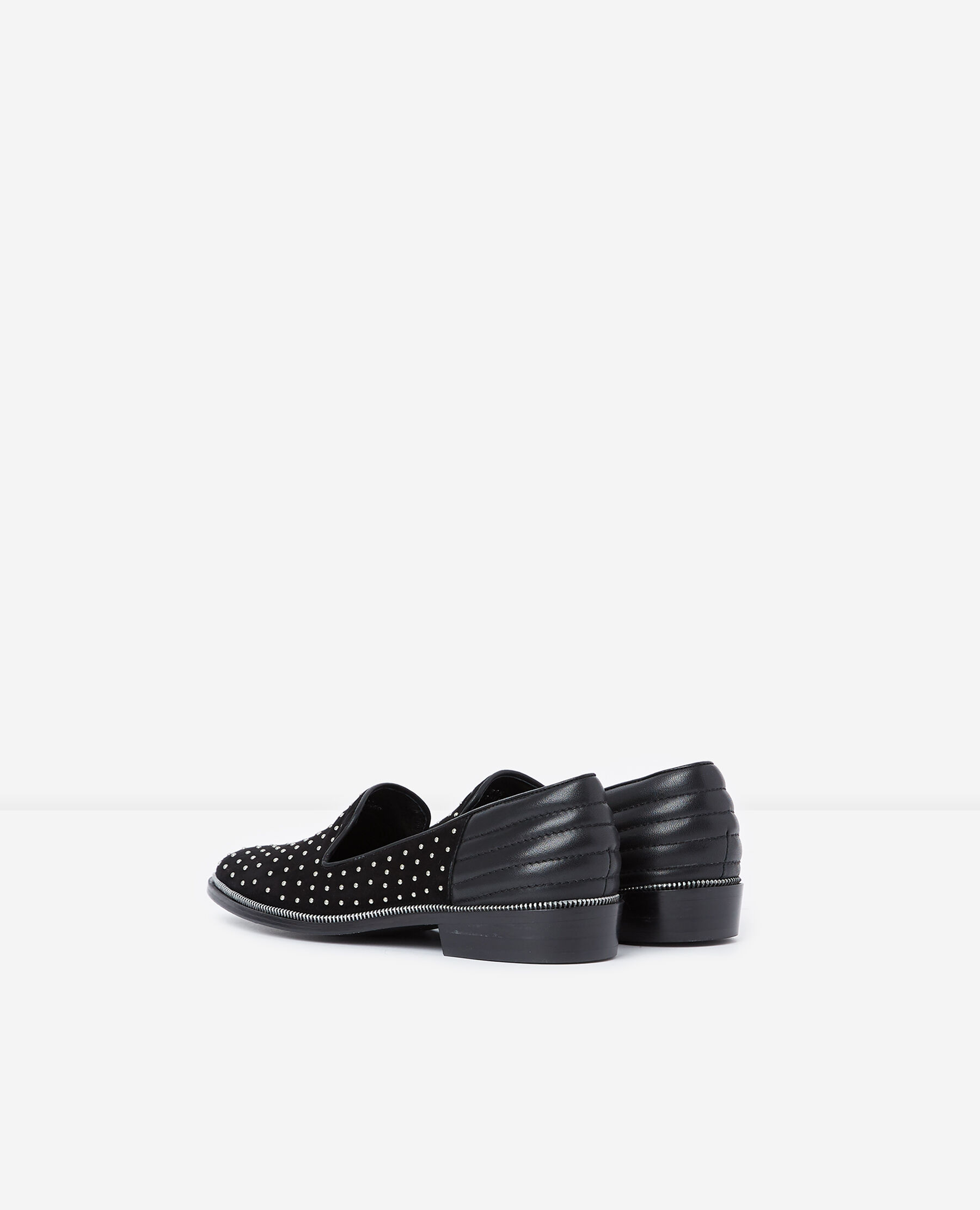 Leather slippers decorated with studs