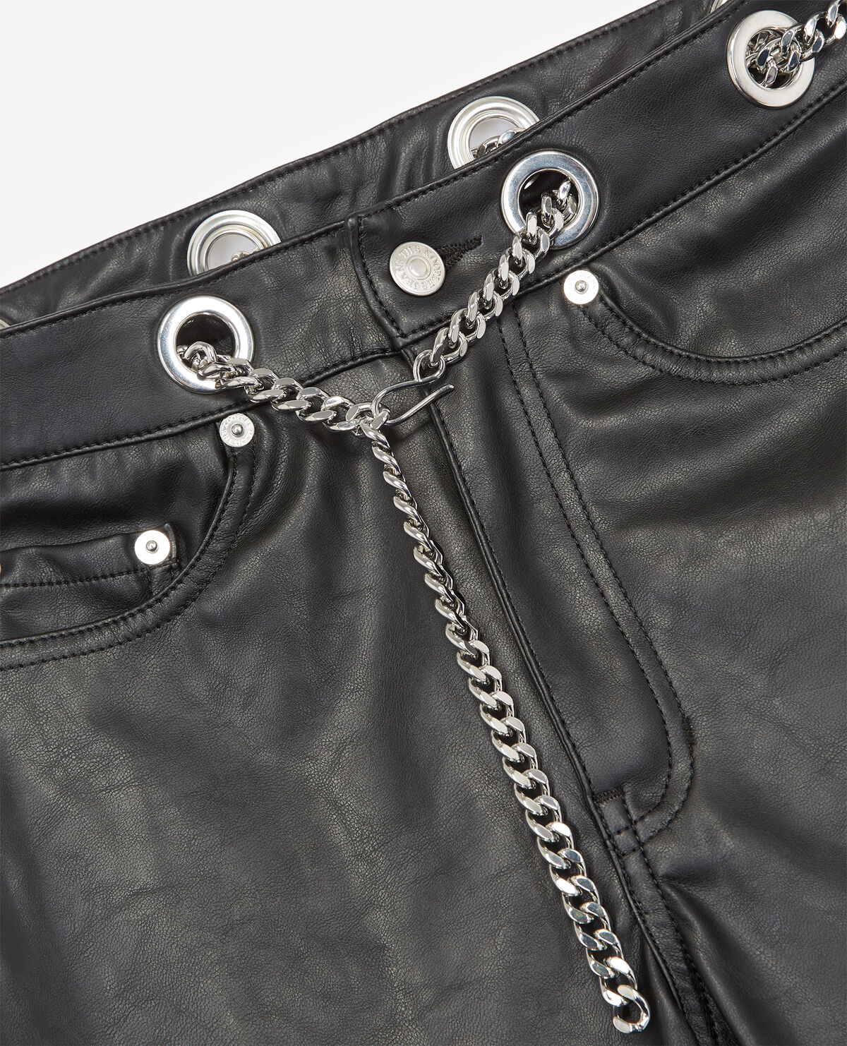 Jean slim noir effet cuir illets