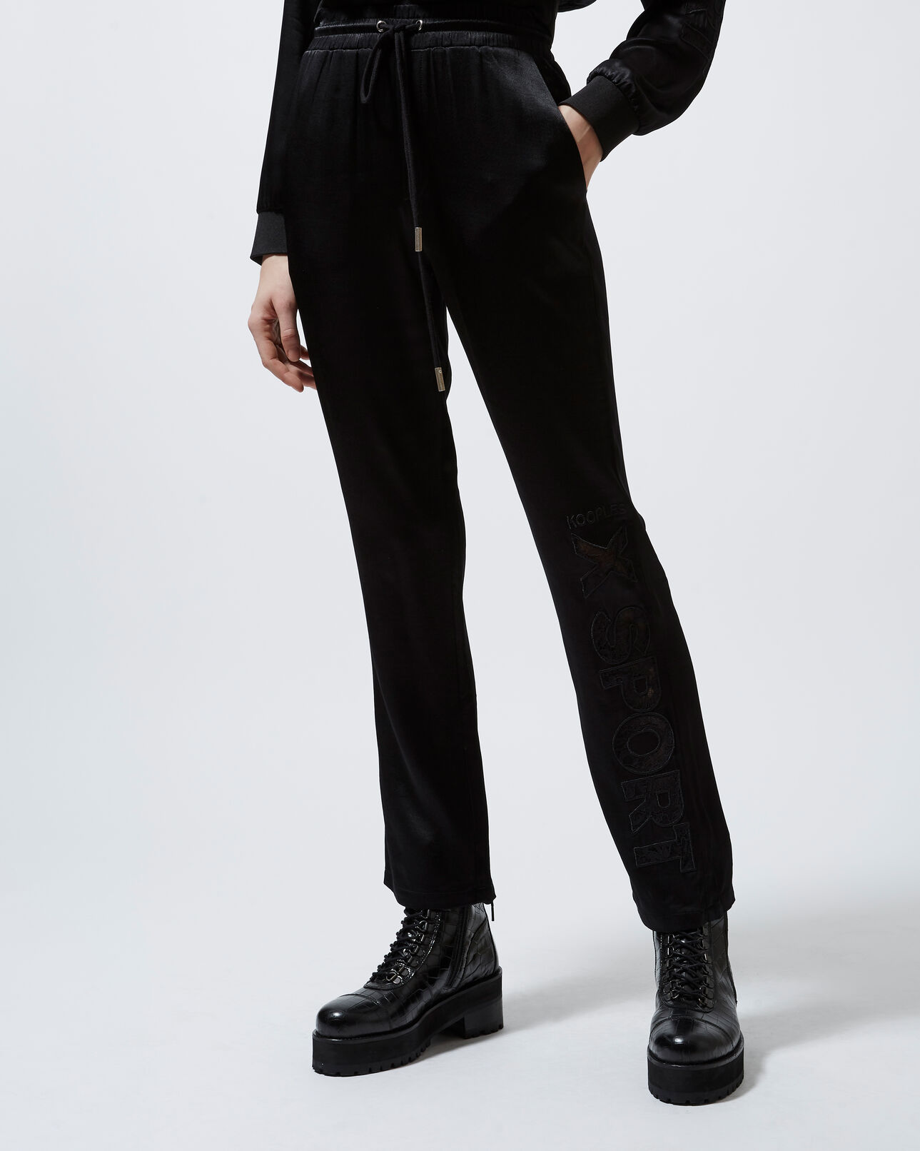 The Kooples WOMEN BLACK flowing black trousers with lace detailing