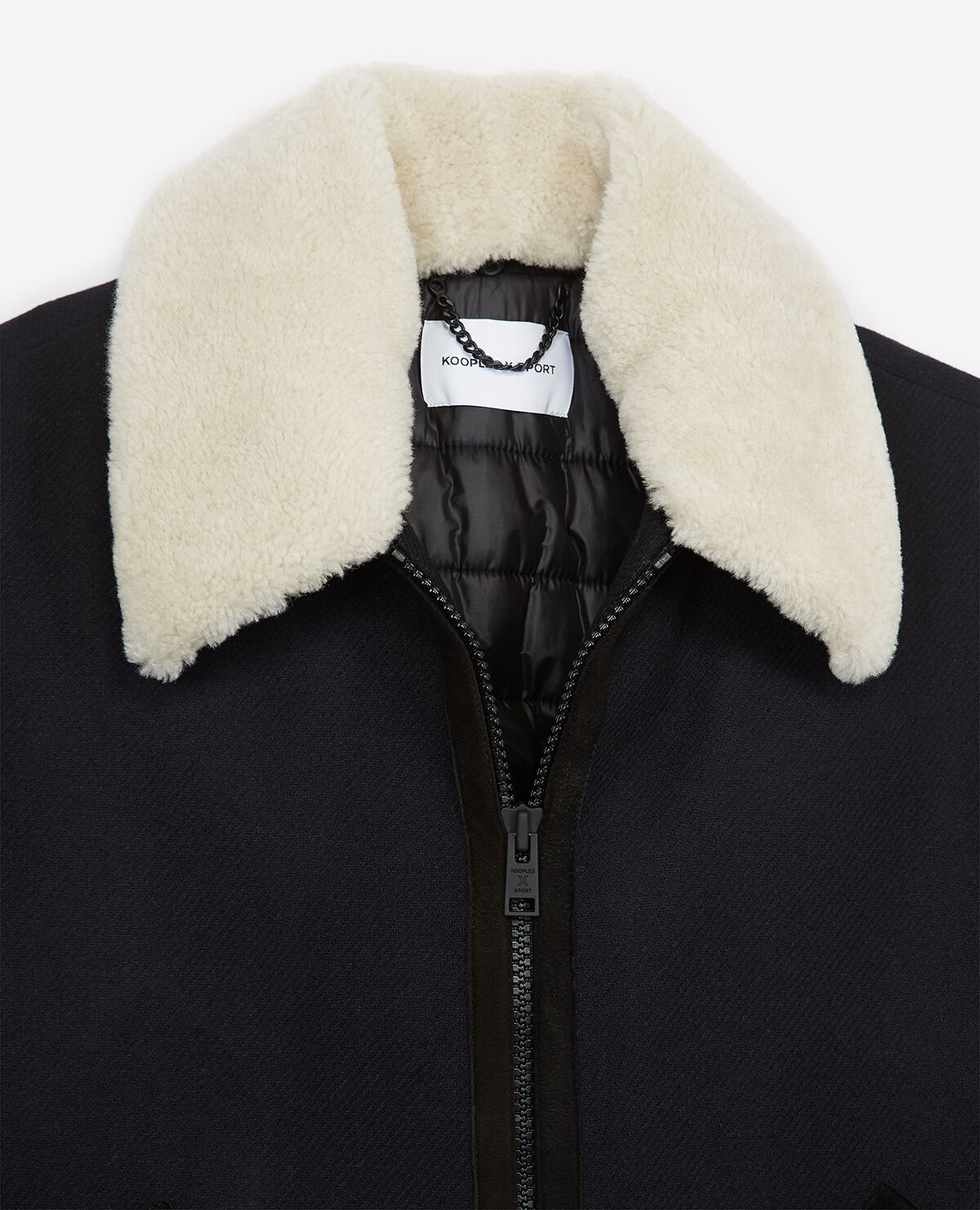 Blue zipped wool jacket with sheepskin collar
