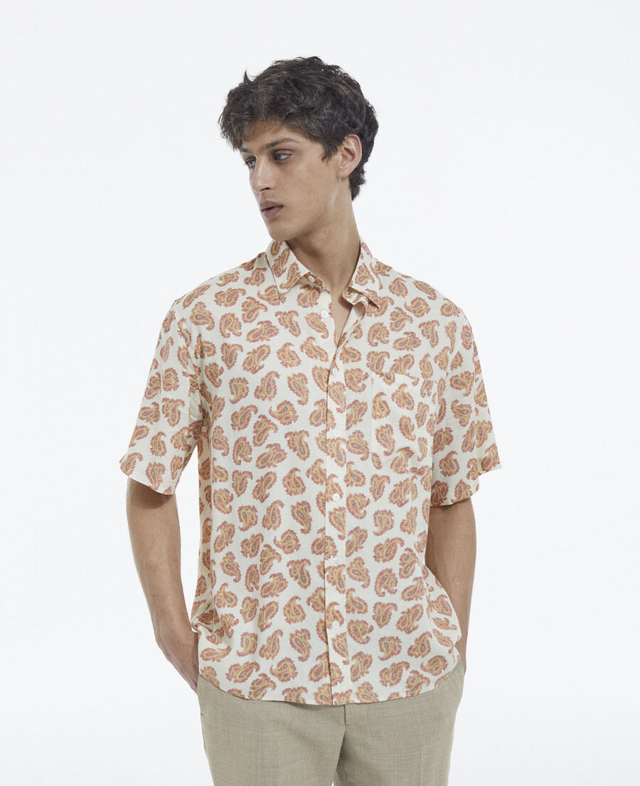 white loose-fitting shirt w/ paisley pattern