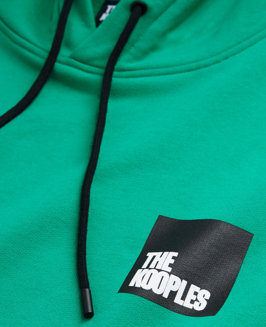 green logo sweatshirt