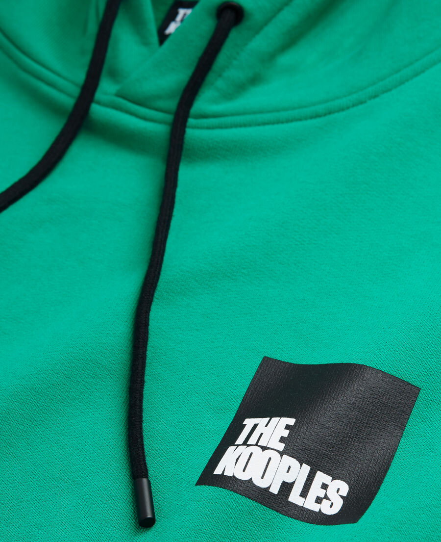 grünes sweatshirt mit logo