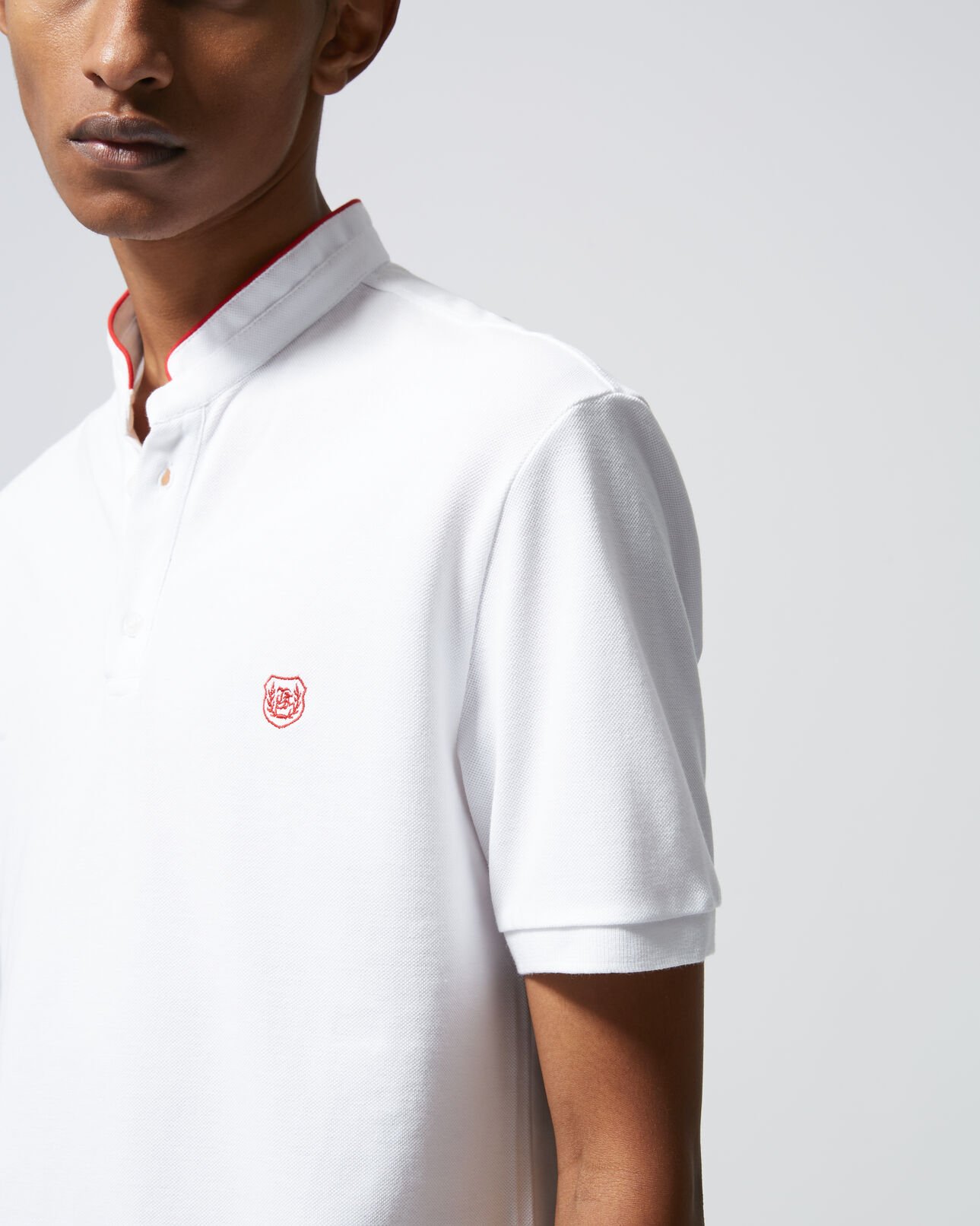 The Kooples HOMME WHITE / FIRED RED polo blanc brodé détails rouge vif