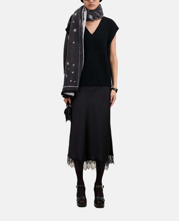 black sleeveless wool sweater