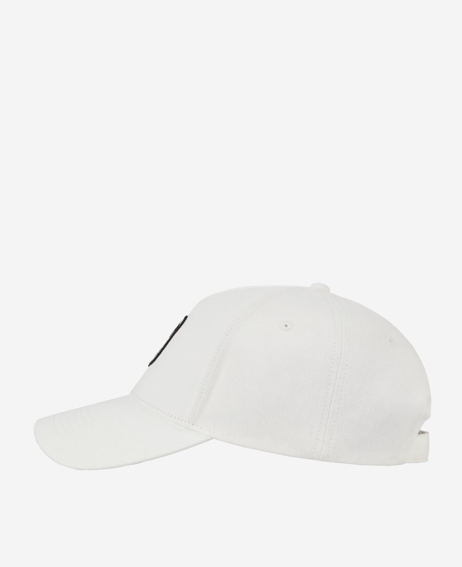 white cap with tk patch