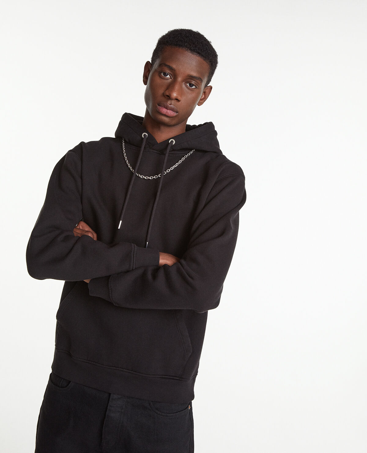 Black hoodie with chain detail