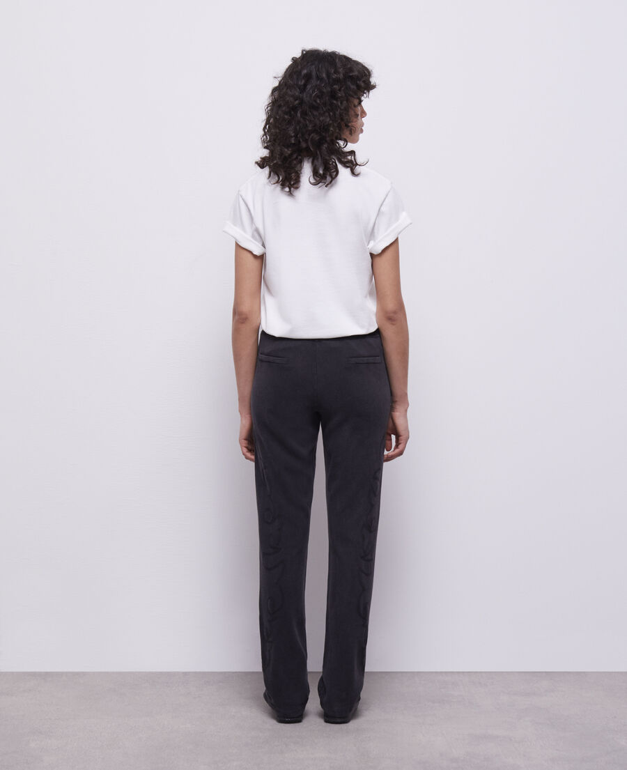 black joggers with western-style embroidery