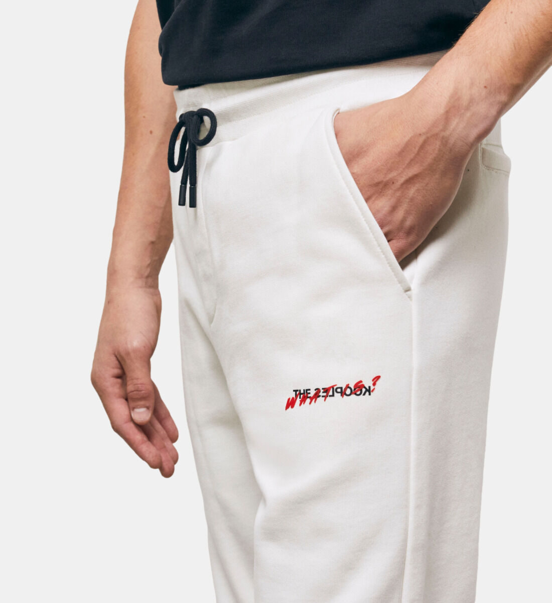 Ecru joggers with What is print
