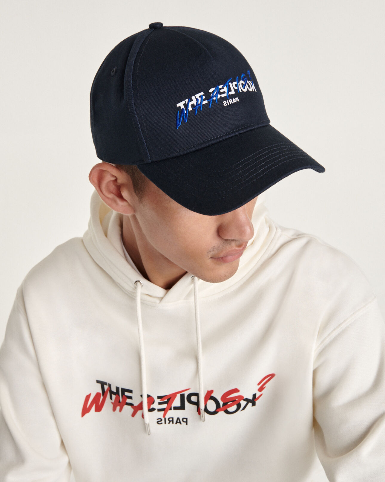 The Kooples MIXED NAVY navy blue cotton cap with embroidered “what is”