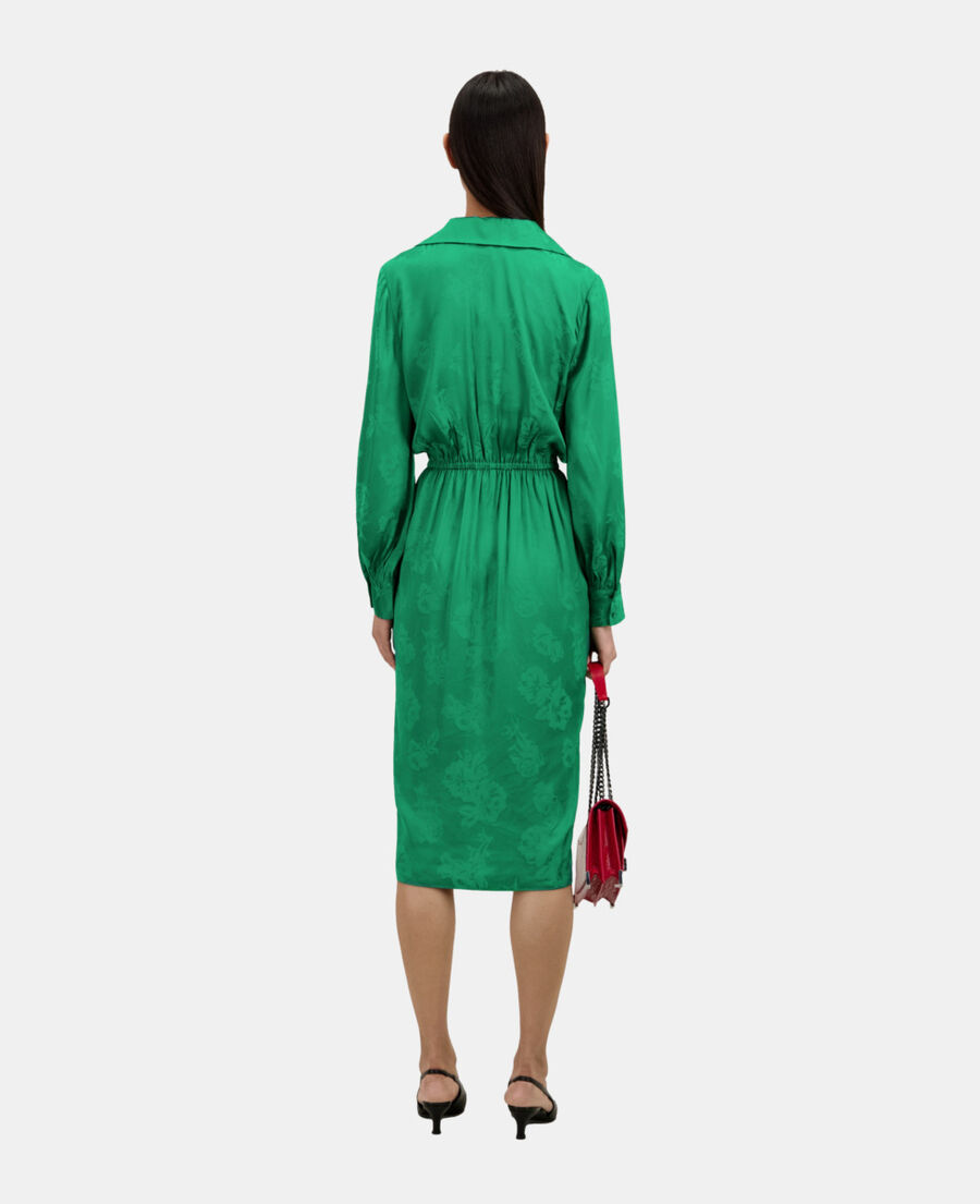 mid-length green dress with flowers