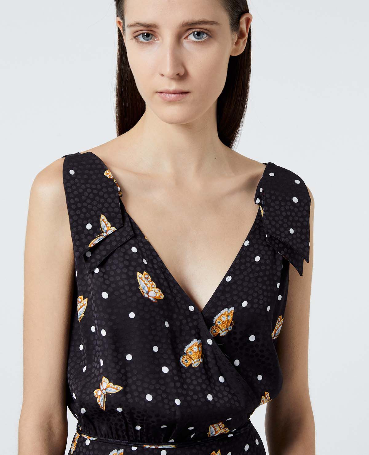 Black wrap dress with butterfly motif