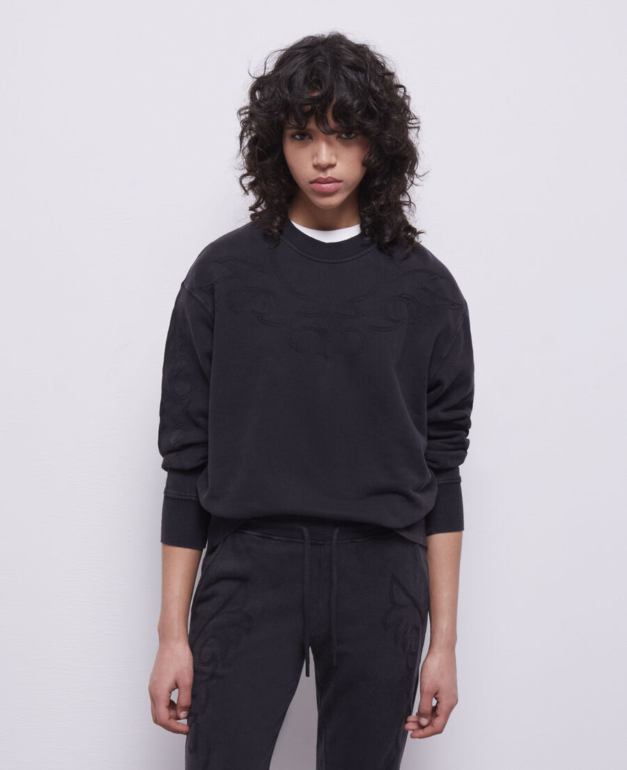 black sweatshirt with western-style embroidery