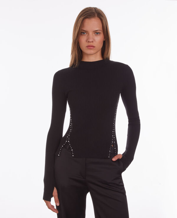 black knit sweater with studs