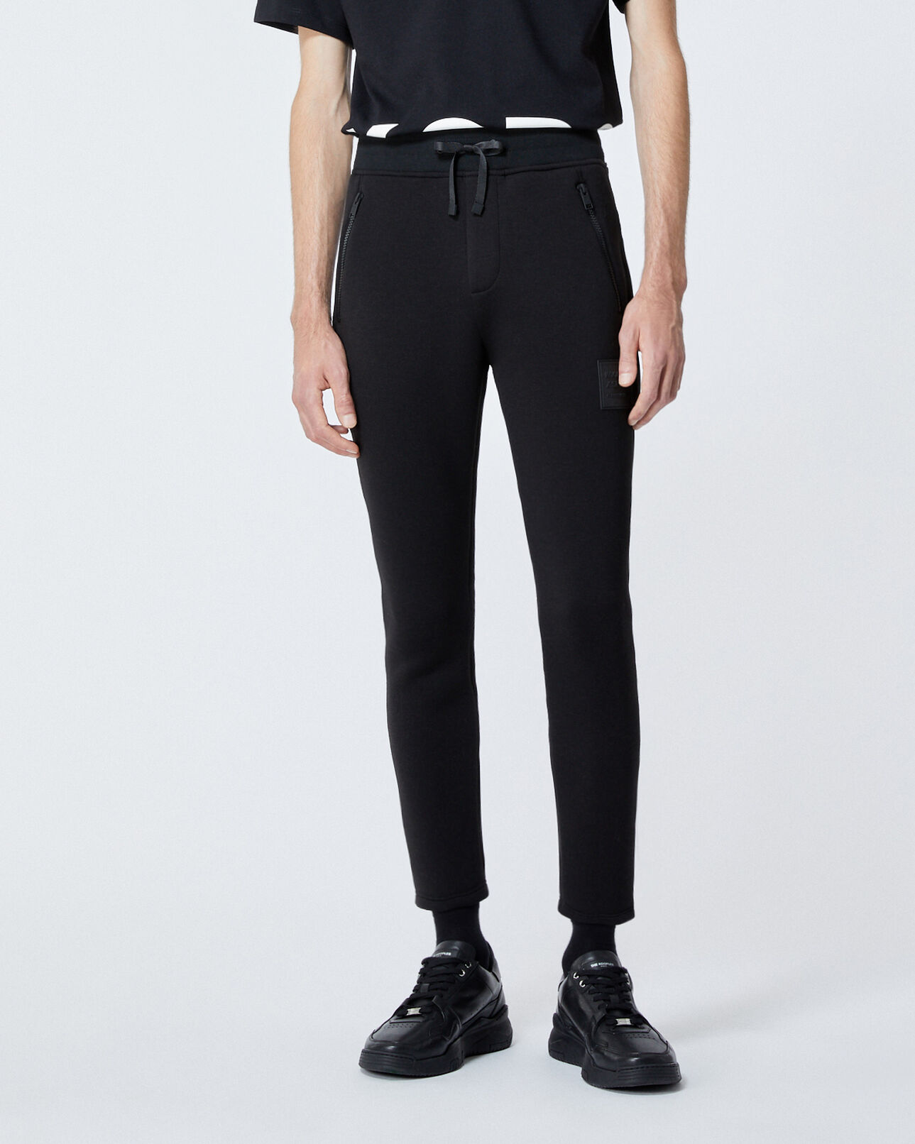 The Kooples MEN BLACK zipped skinny black joggers with logo patch