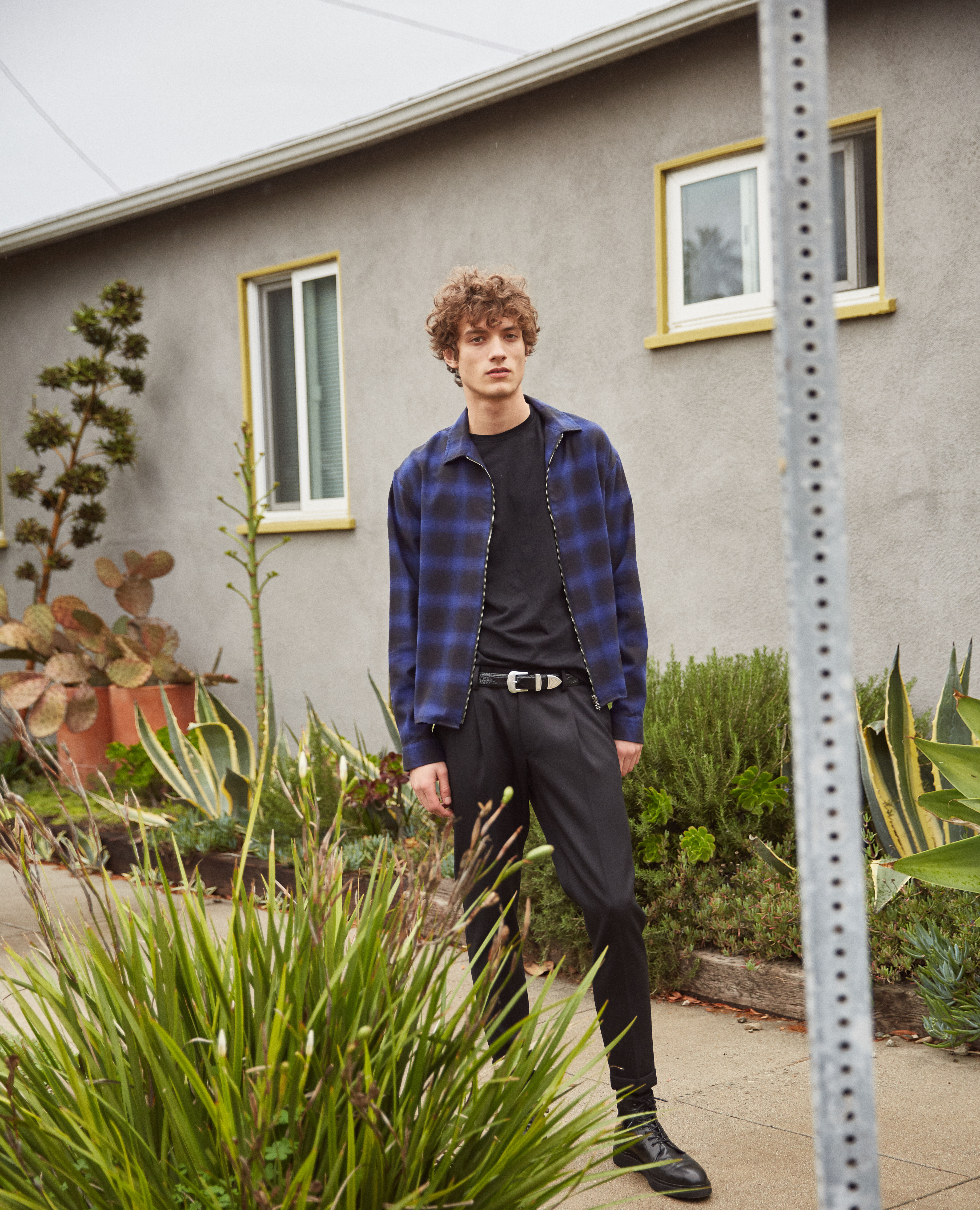 Zipped shirt with black and blue check motif