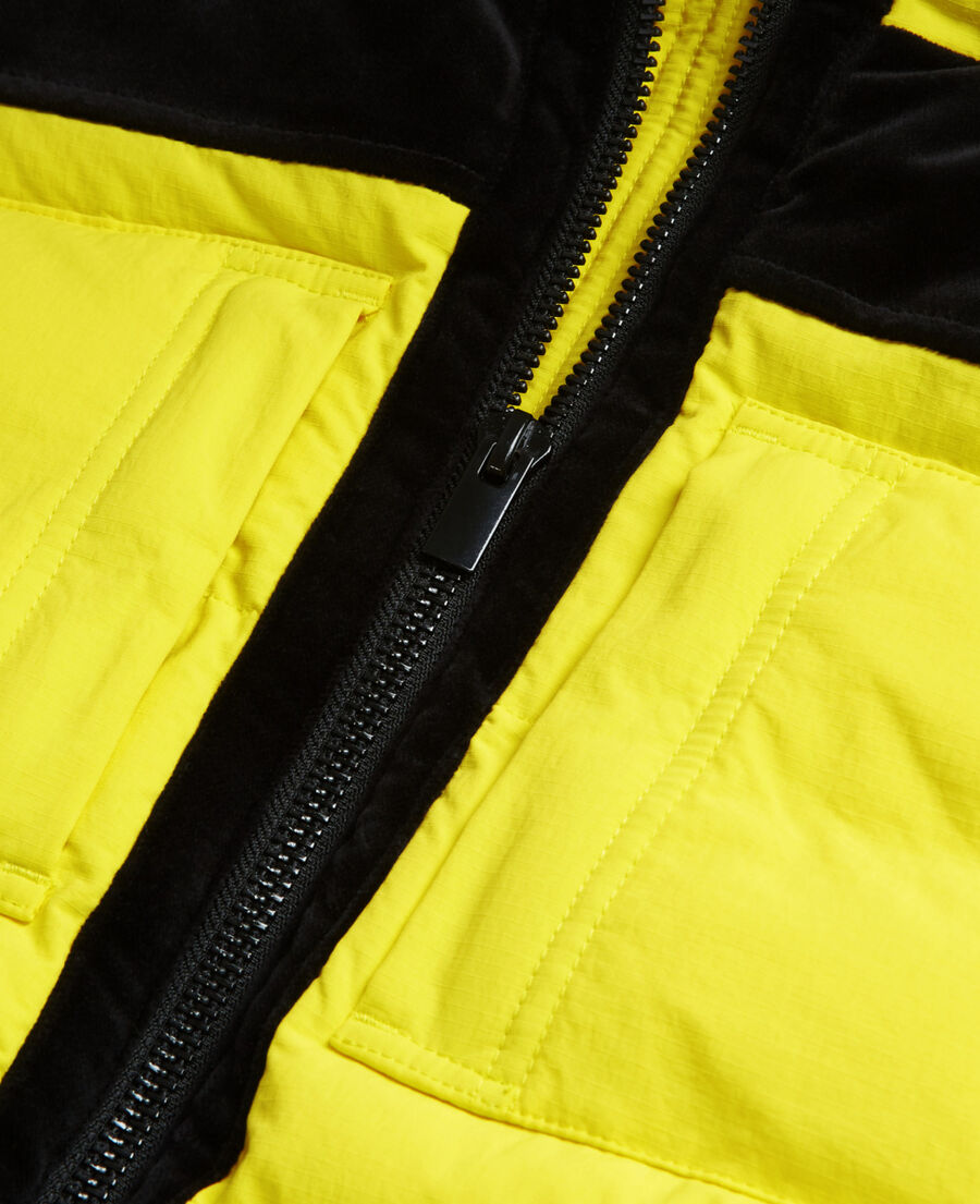 yellow sleeveless down jacket