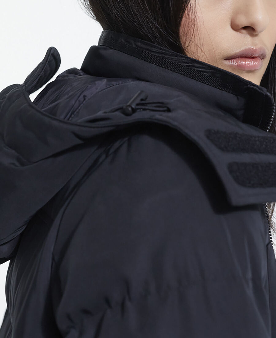 long black down jacket with straps and logo