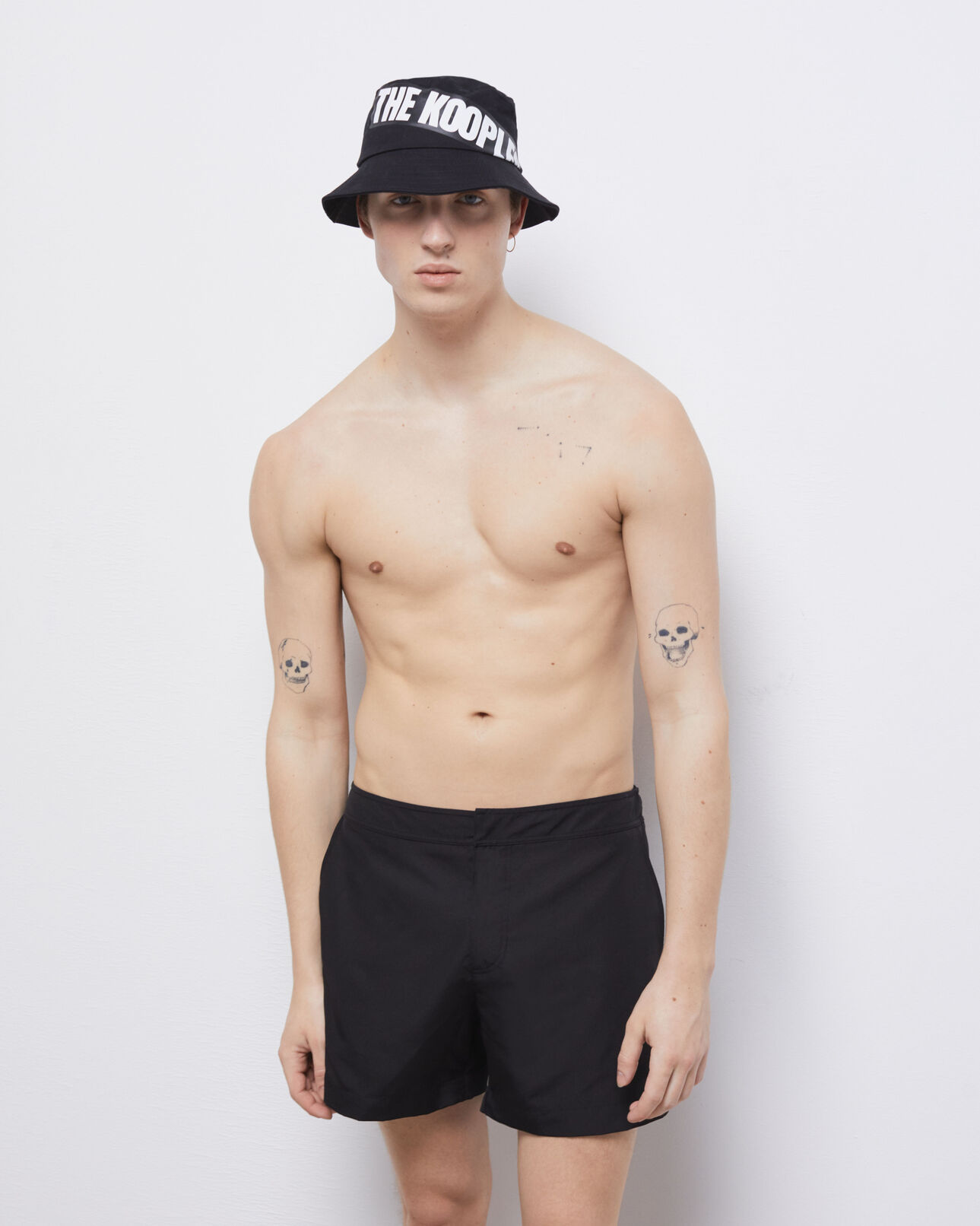 The Kooples MIXED BLACK reversible black bucket hat with tape logo