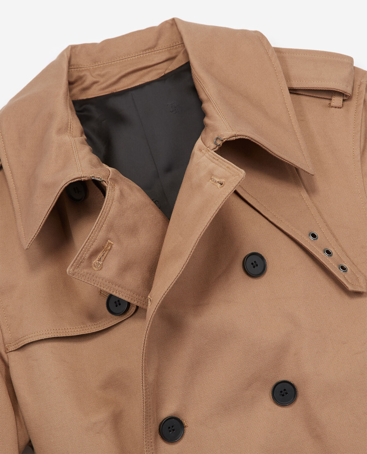 Beige belted double breasted trench coat