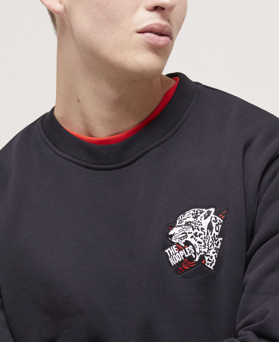 schwarzes sweatshirt mit logo und tiger-motiv