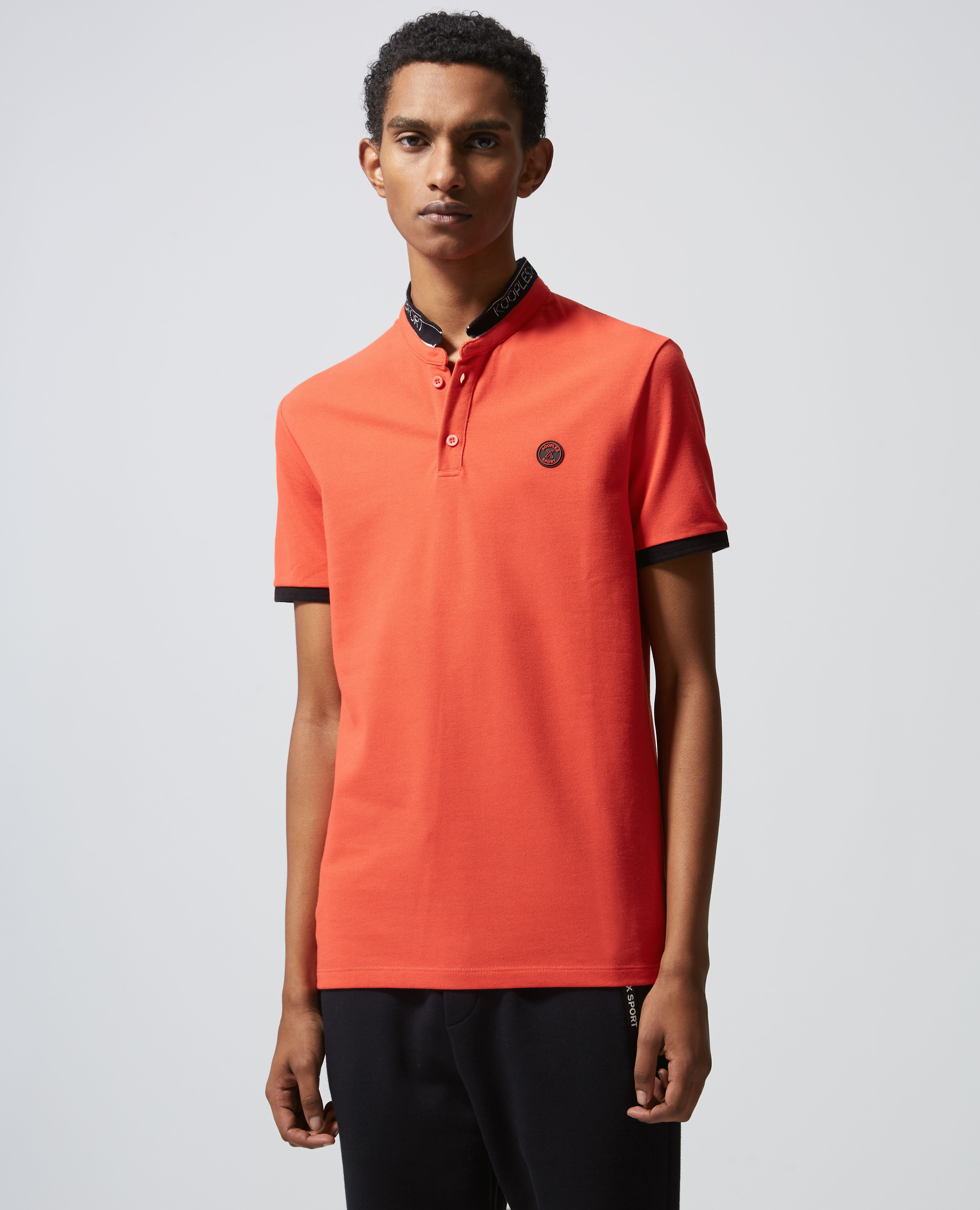 Red jersey polo w officer collar print badge The Kooples