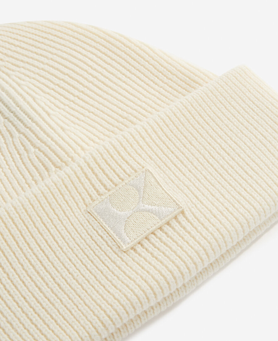 ecru wool beanie with embroidered k patch