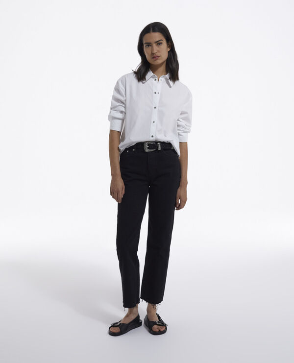 Loose white shirt with press stud fastening