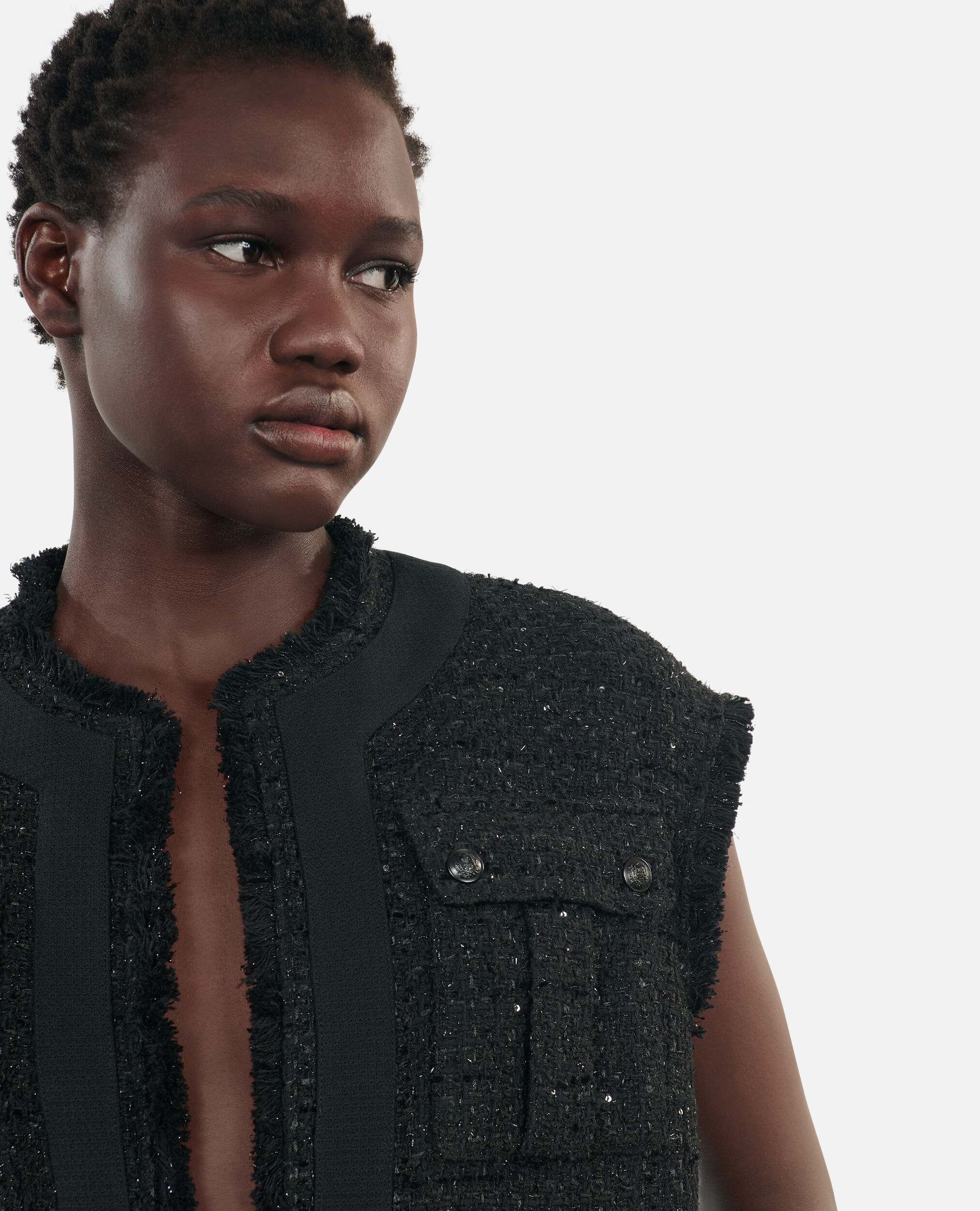 Tweed sleeveless jacket outlet