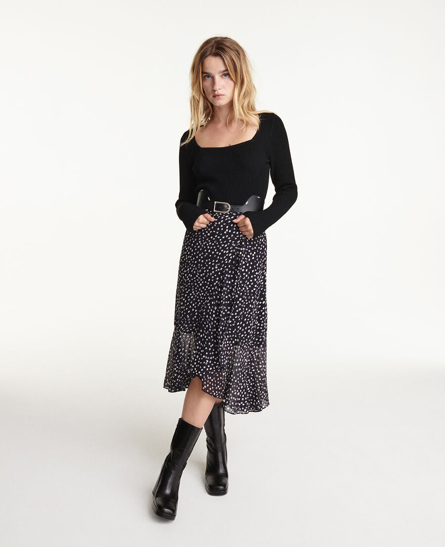 long flowing navy blue skirt with polka dots