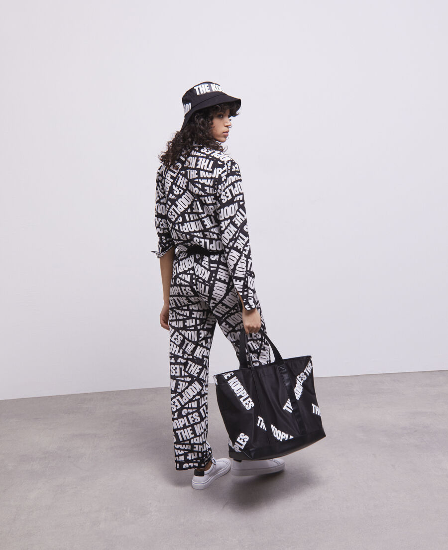 large black tote bag with tape logo