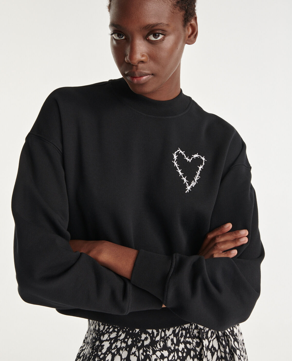 Short black sweatshirt with barb wire heart The Kooples UK