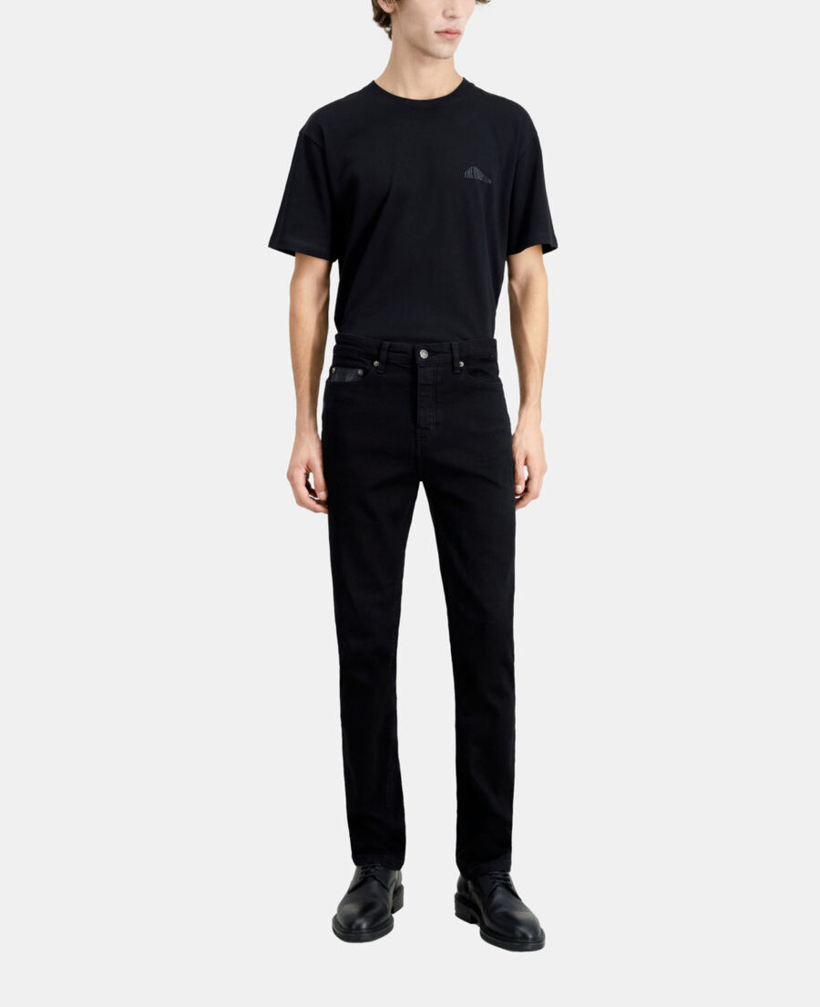 schwarze slim-jeans mit tasche aus leder